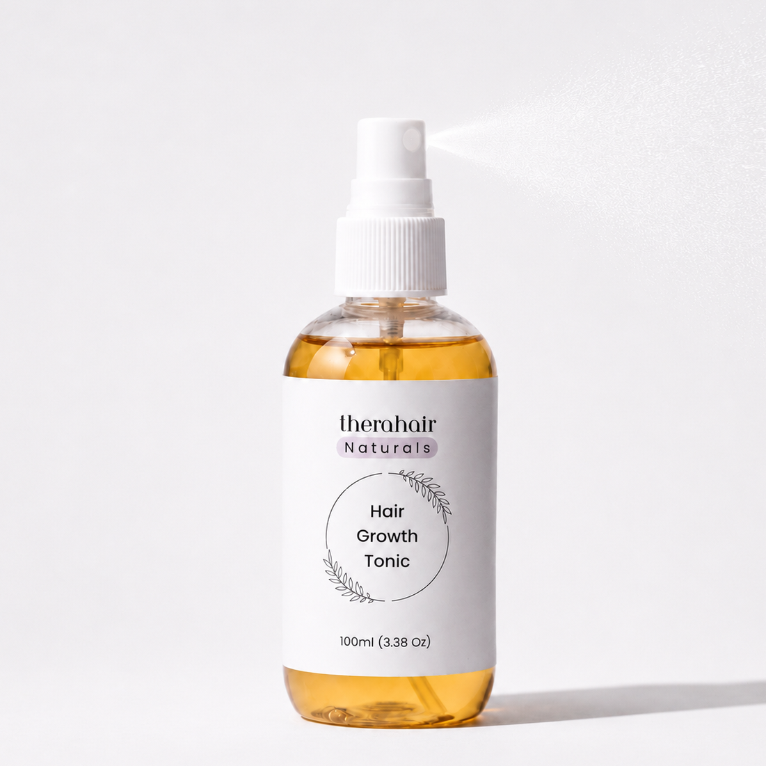 Natural Hair Tonic bottle in soft daylight